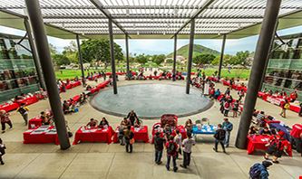 CSU Channel Islands campus fill with organized tables and students about for a club fair.